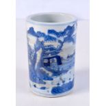 A small Chinese porcelain blue and white brush pot decorated with figures in a landscape 11cm.