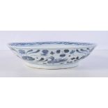 A Chinese porcelain blue and white dish decorated with water fowl 5 x 22 cm.