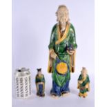 THREE EARLY 20TH CENTURY CHINESE SANCAI GLAZED POTTERY FIGURES Late Qing/Republic. Largest 36 cm hig