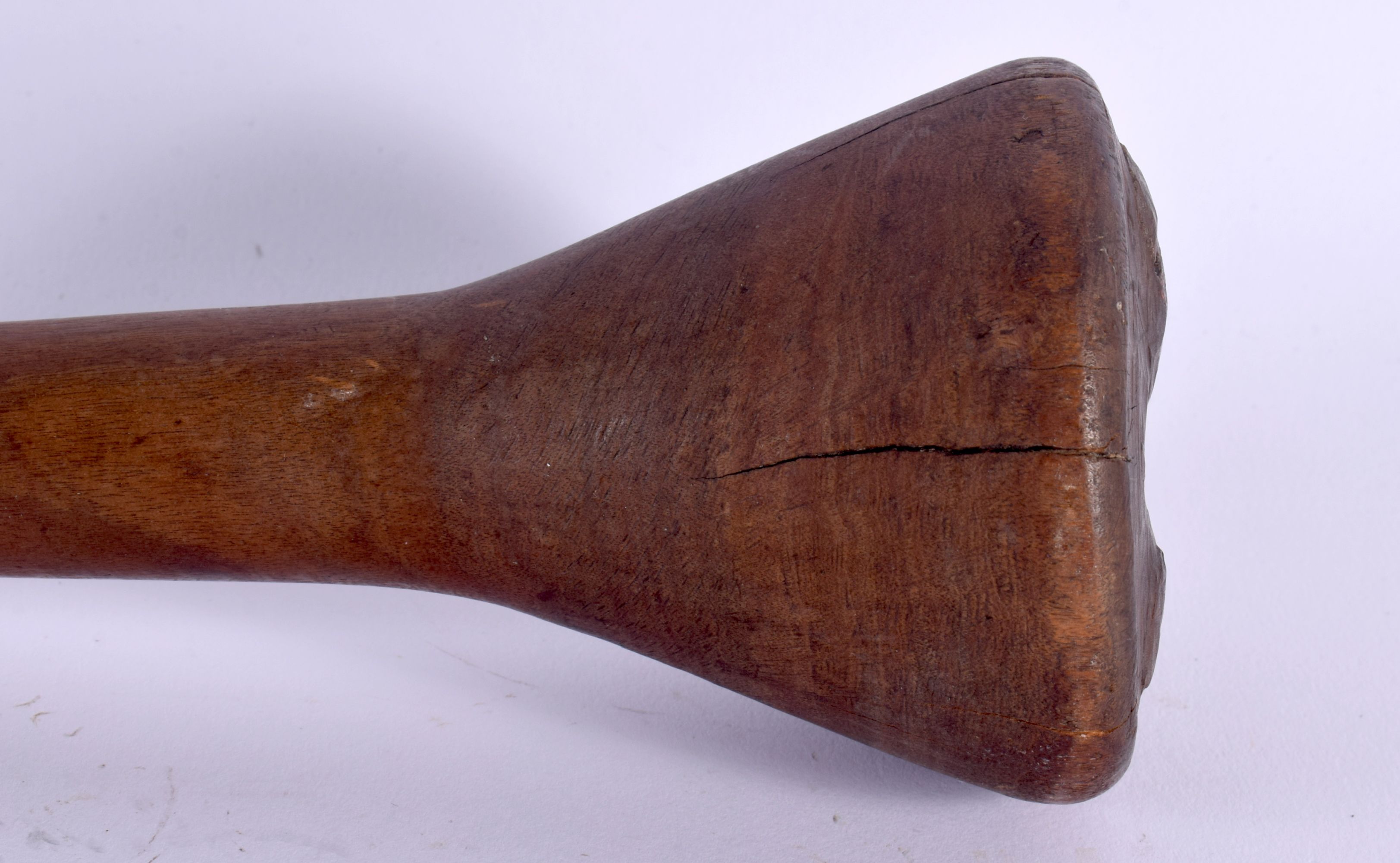 AN EARLY 20TH CENTURY TRIBAL CARVED WOOD THROWING CLUB with dimpled terminal. 47 cm long. - Image 2 of 8