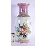 A LARGE CHINESE REPUBLICAN PERIOD FAMILLE ROSE VASE painted with birds. 47 cm high.