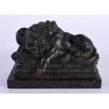 A 19TH CENTURY EUROPEAN GRAND TOUR BRONZE FIGURE OF A LION with central inscription. 12 cm x 9 cm.