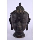 AN ANTIQUE THAI BRONZE BUDDHISTIC BUST. 15 cm x 8 cm.