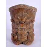 A CHINESE CARVED BUFFALO HORN TYPE LIBATION CUP 20th Century. 11 cm x 9 cm.