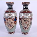 A PAIR OF 19TH CENTURY JAPANESE MEIJI PERIOD CLOSIONNE ENAMEL VASES decorated with phoenix birds. 18