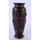 A 19TH CENTURY JAPANESE MEIJI PERIOD BRONZE ONLAID VASE decorated with birds and foliage. 15 cm high