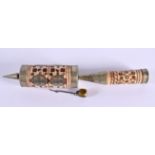 AN UNUSUAL 19TH CENTURY INDIAN BONE INLAID PRAYER WHEEL depicting portraits and motifs. 24 cm long.