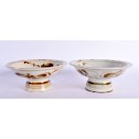 A PAIR OF EARLY 20TH CENTURY CHINESE BROWN GLAZED TAZZA. 9 cm wide.