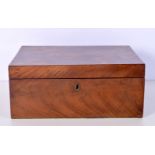 A burr wood box with interior partitioned lifting tray 10 x 25 x 17.5cm.