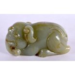 A CHINESE CARVED GREEN JADE ELEPHANT 20th Century. 8.5 cm x 4.25 cm.