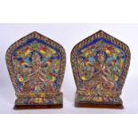 A RARE PAIR OF 19TH CENTURY INDO TIBETAN ENAMELLED COPPER ALLOY BOOK ENDS decorated with buddhistic