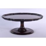 AN EDWARDIAN MAHOGANY LAZY SUSAN. 35 cm wide.