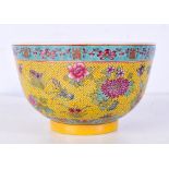 A Chinese porcelain polychrome bowl decorated with flowers and butterflies 8 x 13 cm.