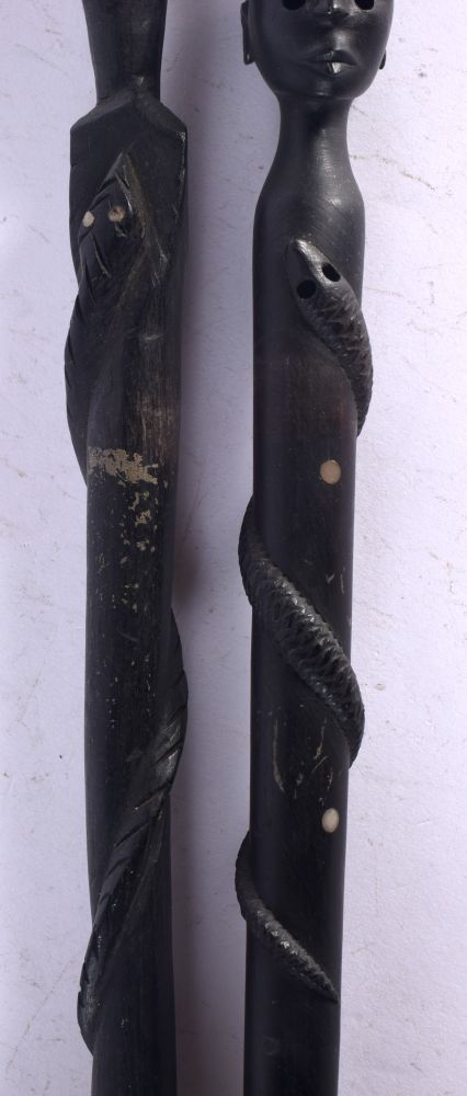 TWO AFRICAN TRIBAL EBONY WALKING STICKS. 85 cm long. (2) - Image 2 of 3