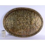 A LARGE 19TH CENTURY MIDDLE EASTERN INDIAN EMBOSSED METAL DISH decorated with figures in various pur