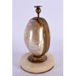 A 19TH CENTURY FRENCH MOTHER OF PEARL GILT METAL SCENT BOTTLE HOLDER in the form of an egg. 14.5 cm