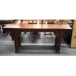 A LARGE 19TH CENTURY CHINESE CARVED HARDWOOD ALTAR TABLE. 200 cm x 50 cm x 87 cm.