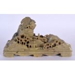 AN EARLY 20TH CENTURY CHINESE CARVED SOAPSTONE MOUNTAIN BRUSH REST Late Qing/Republic. 15 cm x 9 cm.