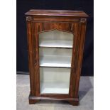 An Antique veneered wooden glass fronted book shelf125 x 68 x 36 cm