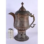 A LARGE ANTIQUE MIDDLE EASTERN COPPER ALLOY TEA URN with pierced base. 43 cm x 22 cm.