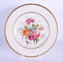 A LATE 18TH/19TH CENTURY EUROPEAN PORCELAIN CABINET PLATE painted with flowers. 20 cm diameter.
