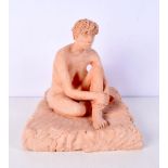A clay sculpture of a naked female signed Gowan 98 27 cm .