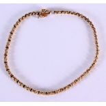 A 14CT GOLD AND DIAMOND LINE BRACELET. 6.5 grams. 18.5 cm long.