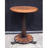 A small 19th Century side table with petal shaped base and scrolling feet legs 52 x 40 cm