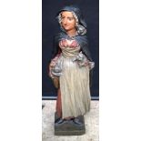 A large European Folk Art Terracotta figure of a female 84 x 27 cm.