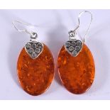 A PAIR OF SILVER AND AMBER EARRINGS. 7 grams. 5 cm x 2 cm.