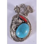 A CONTINENTAL SILVER, TURQUOISE AND CORAL PENDANT. Stamped 925, chain 46cm, pendant 7.5cm x 4.5cm x