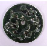 AN UNUSUAL CHINESE QING DYNASTY MOUNTAIN JADE SPINACH BI DISC overlaid with two chilong. 11 cm diame