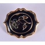 AN ANTIQUE YELLOW METAL AND ENAMEL GEM SET MOURNING BROOCH. 17.5 grams. 4.25 cm x 3.75 cm.