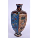 AN EARLY 20TH CENTURY JAPANESE MEIJI PERIOD CLOISONNE ENAMEL VASE decorated with foliage and dragons