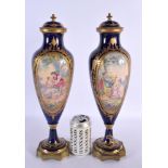 A LARGE PAIR OF 19TH CENTURY FRENCH SEVRES PORCELAIN VASES with bronze mounts. 38 cm high.