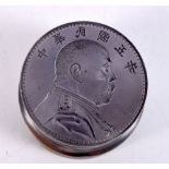 A Chinese metal coin press 4 x 5 cm.