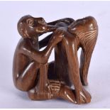 A JAPANESE EROTIC MONKEY NETSUKE. 5.5 cm x 4.5 cm.