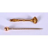 A VICTORIAN 15CT GOLD TIE PIN and another 15ct gold brooch. 3.9 grams. Largest 5.5 cm. (2)