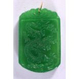 A CHINESE GOLD MOUNTED JADE PENDANT 20th Century. 5.5 cm x 4.5 cm.