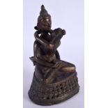 A 19TH CENTURY SOUTH EAST ASIAN INDIAN BRONZE EROTIC BUDDHA. 17 cm x 9 cm.