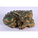 A CHINESE BRONZE SCROLL WEIGHT 20th Century, modelled as a scowling beast. 6 cm x 3 cm.