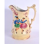 A 19TH CENTURY SUNDERLAND LUSTRE POTTERY JUG decorated with figures. 21 cm x 14 cm.