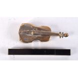 A small brass vesta case in the shape of a violin together with a small lighter 8cm (2).