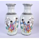 A PAIR OF CHINESE REPUBLICAN PERIOD FAMILLE ROSE VASES painted with figures. 21 cm high.