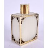 AN ASPREY'S SILVER GILT MOUNTED SCENT BOTTLE HOLDER. 10 cm x 6 cm.