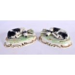A PAIR OF 19TH CENTURY STAFFORDSHIRE FIGURES OF GREYHOUNDS. 11 cm x 8 cm.