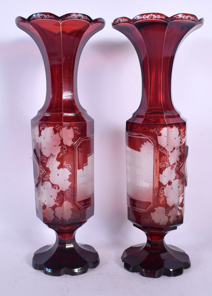 A PAIR OF LATE 19TH CENTURY BOHEMIAN CRANBERRY GLASS VASES engraved with The Great Exhibition Indust - Image 3 of 5