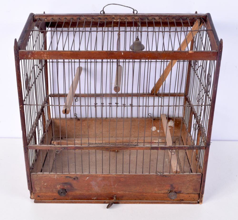 A Victorian wood and metal bird cage 38 x 36 x 27 cm.