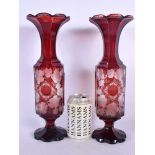 A PAIR OF LATE 19TH CENTURY BOHEMIAN CRANBERRY GLASS VASES engraved with The Great Exhibition Indust