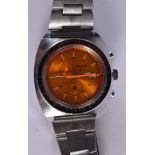 A VINTAGE SICURA ORANGE DIAL PEPSI BANDED WRISTWATCH. 4.25 cm wide inc winder.